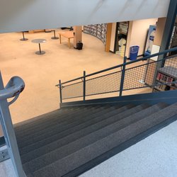 Fort Lee Public Library - Downstairs. Don't ask if any magazines are available to look at. Worker putting away tapes rude