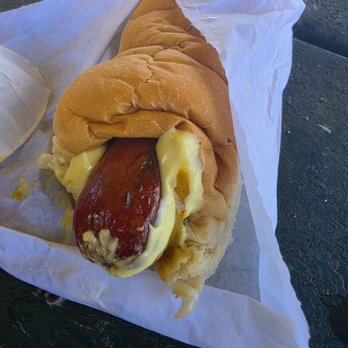 Puka Dog - Polish sausage with lilikoi mustard and mango relish - Hot Dogs Near Me - Koloa, Hawaii Puka Dog - Polish sausage with lilikoi mustard and mango relish - Hot Dogs Near Me - Koloa, Hawaii