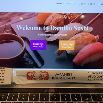 Damiko Sushi - Copy of the invoice and chopsticks. - Japanese Near Me - Surrey, British Columbia