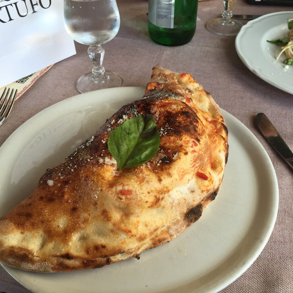 The Giant Calzone I'm about to partake! The Giant Calzone I'm about to partake!