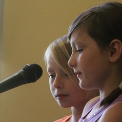 Michele Holland Piano & Voice - Sisters sharing a song at their first recital.