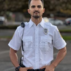 Elite Guard Security Services - Meet our dedicated professional security guard from EGSS! With a keen eye for detail and a commitment to safety.