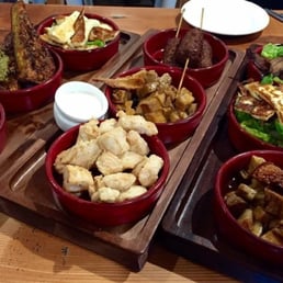 Our tapas selection- haloumi, dolmades, corn & zucchini fritters, lamb koftas, popcorn chicken, crispy pancetta, pork belly.