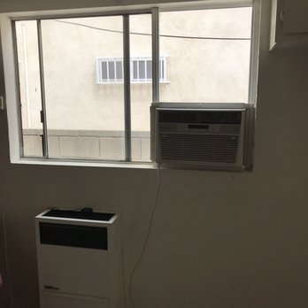 Neil's Handyman Services - Plexiglass installed above the AC so light can still come in - Handyman Near Me - newport beach, California