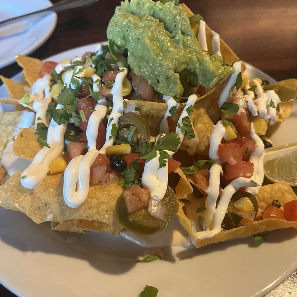 Wyld Pines Bar & Restaurant - Happy hour nachos - Pubs Near Me - Camas, Washington Wyld Pines Bar & Restaurant - Happy hour nachos - Pubs Near Me - Camas, Washington