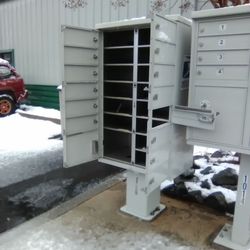 US Post Office - This is how the Post Office leaves our mailboxes at our business complex.... WIDE OPEN!!