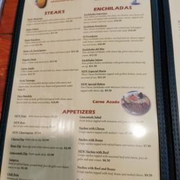Menu - The menu lists various food options including steaks, enchiladas, and appetizers, with prices and descriptions, from Mi Monterrey in Morehead, KY.