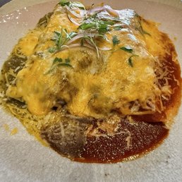 Chicken enchiladas, 3 different sauces: red, green & mole.