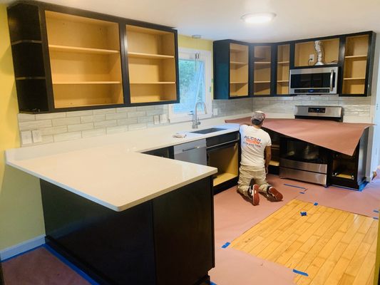 Kitchen Cabinet Painting Project - All cabinets were repainted for our client. Kitchen Cabinet Painting Project - All cabinets were repainted for our client.