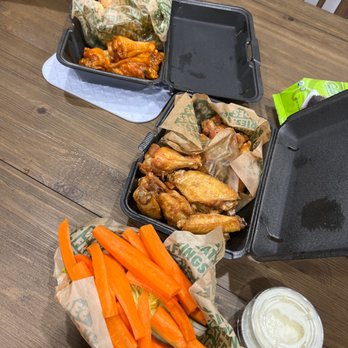 Wingstop - a tray of carrots and a tray of wings - Chicken Wings Near Me - Westminster, California
