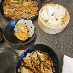 Beef chao fun, potstickers, spicy wonton Beef chao fun, potstickers, spicy wonton