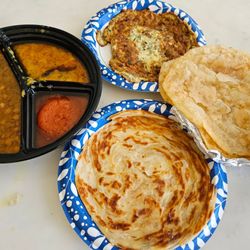 Cafe Acai - Halwa poori chholay and anda paratha