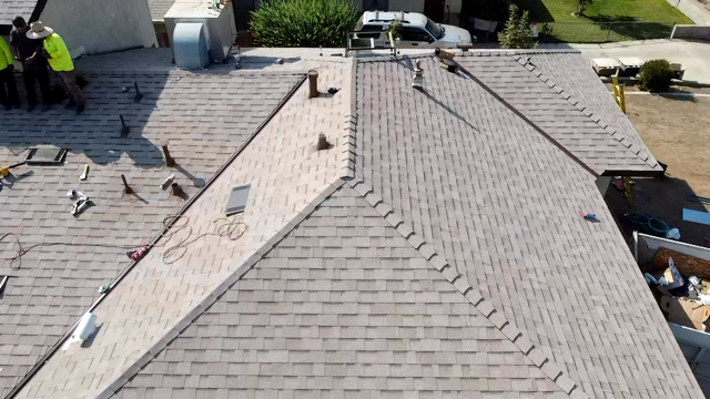 Slide of Ed and J United Roofing