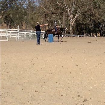 Bradshaw Equestrian & Co. - Kelsea giving instructions and direction during a lesson - Horseback Riding Near Me Bradshaw Equestrian & Co. - Kelsea giving instructions and direction during a lesson - Horseback Riding Near Me