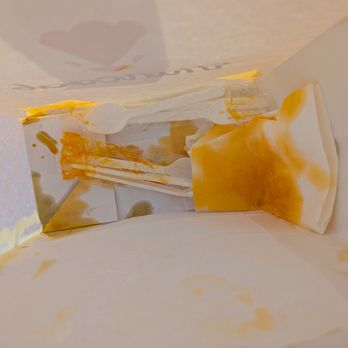 Hancock - Inside of the takeout bag soaked with oil - Chicken Shop Near Me - Grand Rapids, Michigan