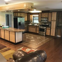 A Golden Rule Cabinetry - Custom made hickory and walnut cabinetry.