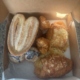 Ham and cheese croissants. Palmier,  and kouign-amann .