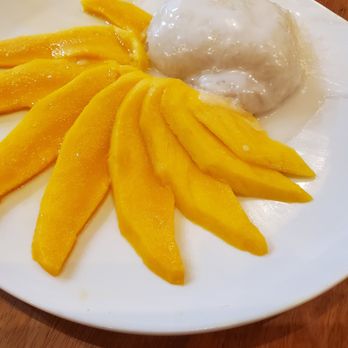Tahn Thai - mangoes and ice cream on a white plate - Thai Near Me - McKinney, Texas Tahn Thai - mangoes and ice cream on a white plate - Thai Near Me - McKinney, Texas