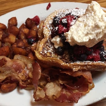 The Continental Westhampton - Mixed Berry French Toast. 3 large pieces of French toast, each layered with berries. Super delicious. - New American Near Me - Richmond, Virginia The Continental Westhampton - Mixed Berry French Toast. 3 large pieces of French toast, each layered with berries. Super delicious. - New American Near Me - Richmond, Virginia