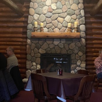 Williams's Pine Gables - a dining room with a stone fireplace - Supper Clubs Near Me - Eagle River, Wisconsin