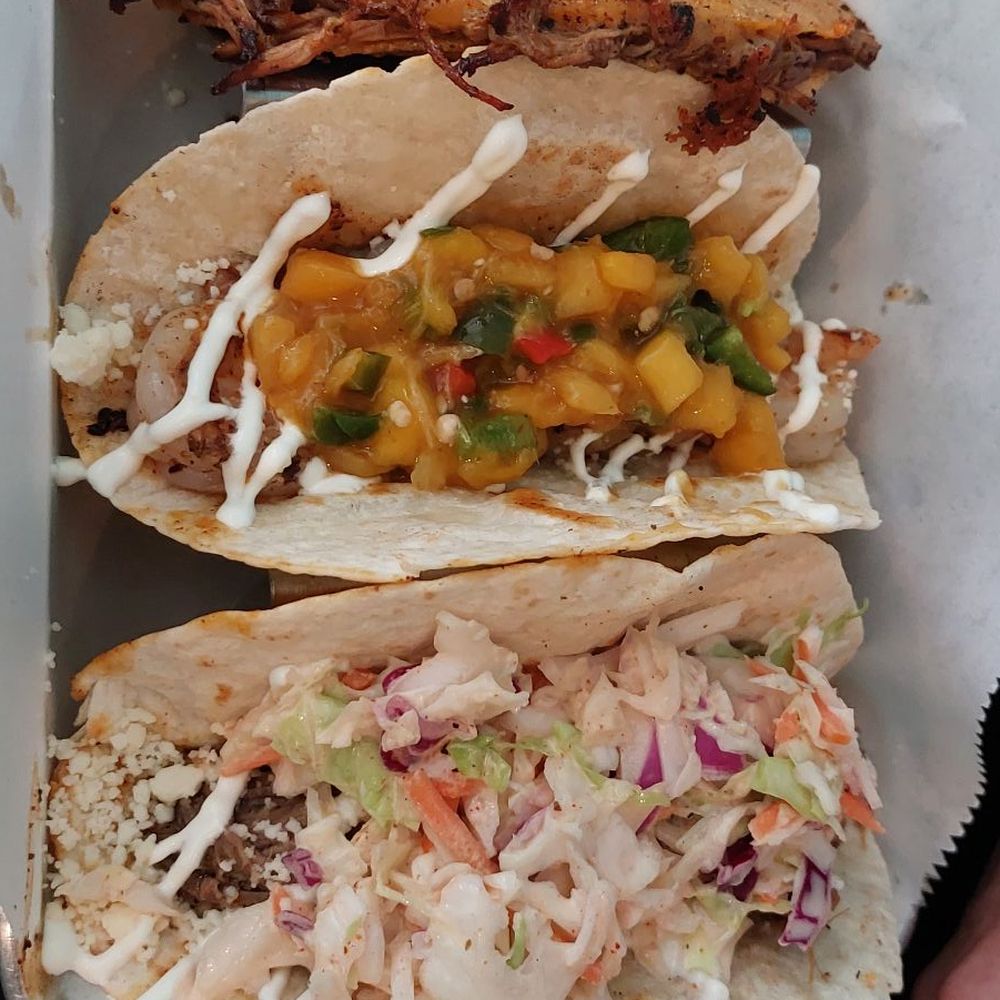 Local shrimp (mango habanero), carnitas, and birria tacos Local shrimp (mango habanero), carnitas, and birria tacos