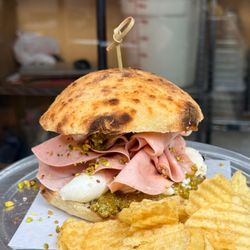 Full Monti
Burrata, Mortadella, Pistachio pesto on the house sourdough puglian roll