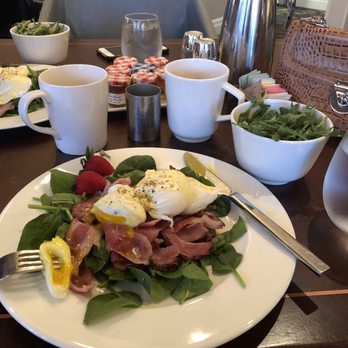 High Street Grill - Eggs Benedict on a bed of fresh spinach, side of arugula salad. - American Near Me - Columbus, Ohio High Street Grill - Eggs Benedict on a bed of fresh spinach, side of arugula salad. - American Near Me - Columbus, Ohio