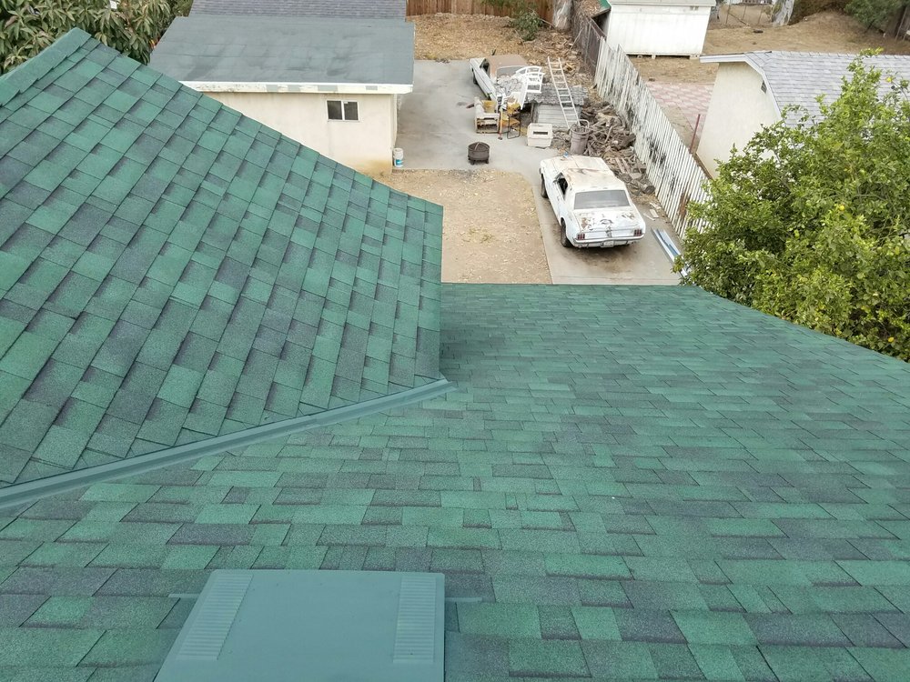 Slide of H&M ROOFING