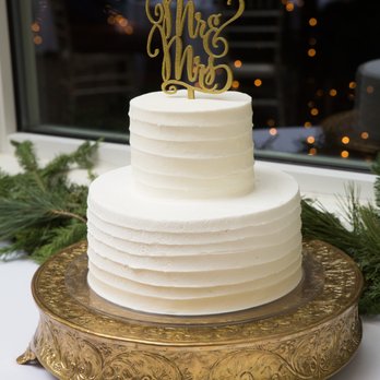 Tiers of Joy - a wedding cake on a gold platter - Bakeries Near Me