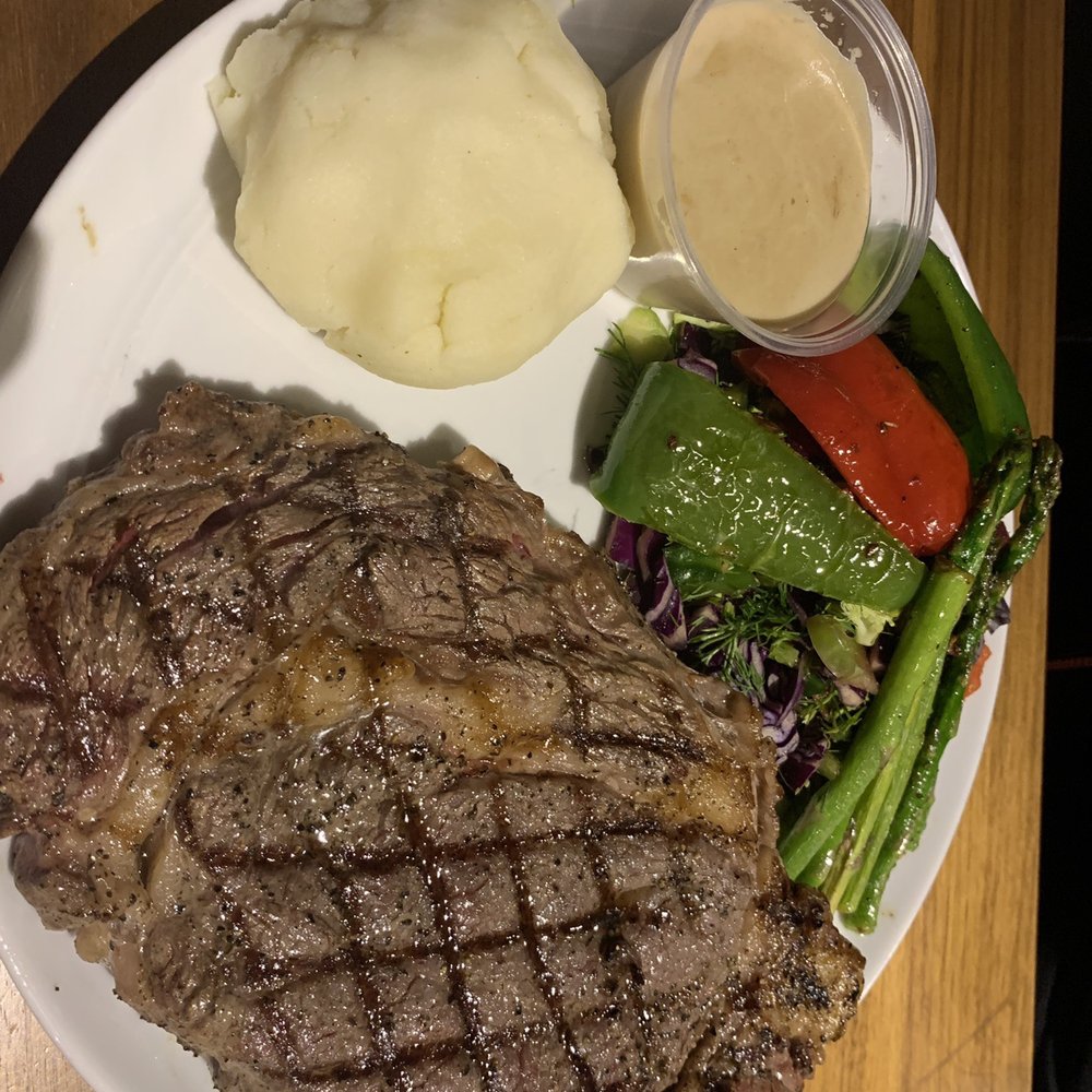 Prime Rib Steak w/mashed potato, vegetables & gravy.