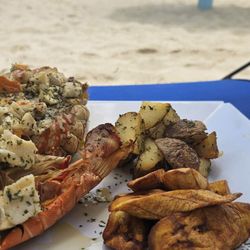 Darkwood Beach Bar & Restaurant - Local lobster with sautéed potatoes and plantains.