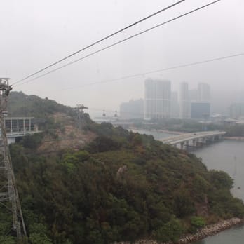 東涌纜車站 - View of the first transfer point when heading up. Lost site of the ground shortly after this due to the cloud cover. - Public Transportation Near Me - Hong Kong, HK 東涌纜車站 - View of the first transfer point when heading up. Lost site of the ground shortly after this due to the cloud cover. - Public Transportation Near Me - Hong Kong, HK