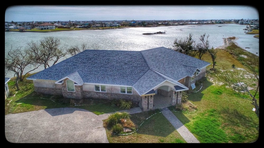 Slide of Garza Roofing