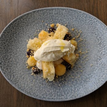 Parc - Truly spectacular olive oil cake with olive oil ice gelato, lemon curd, and blueberry accents. - New American Near Me - Detroit, Michigan Parc - Truly spectacular olive oil cake with olive oil ice gelato, lemon curd, and blueberry accents. - New American Near Me - Detroit, Michigan