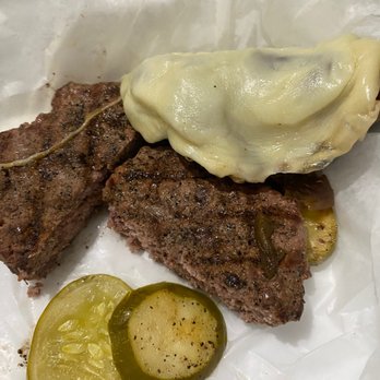 Coasters Taphouse - Cheese melted onto toppings and not burger ‍ - Gastropubs Near Me - Cocoa Beach, Florida