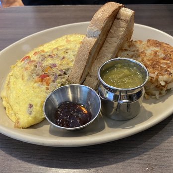 Snooze, an A.M. Eatery - 3 Egg Omelet (comes with 3 enhancements, any extra comes with additional charge) - Breakfast & Brunch Near Me - Houston, Texas Snooze, an A.M. Eatery - 3 Egg Omelet (comes with 3 enhancements, any extra comes with additional charge) - Breakfast & Brunch Near Me - Houston, Texas