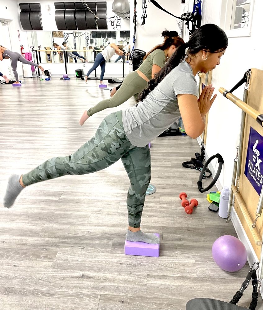 IM=X Pilates & Fitness Logo