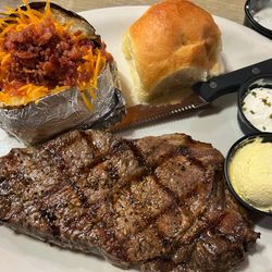 The Woodshed - 14 oz NY Strip w/ loaded baked potatoe