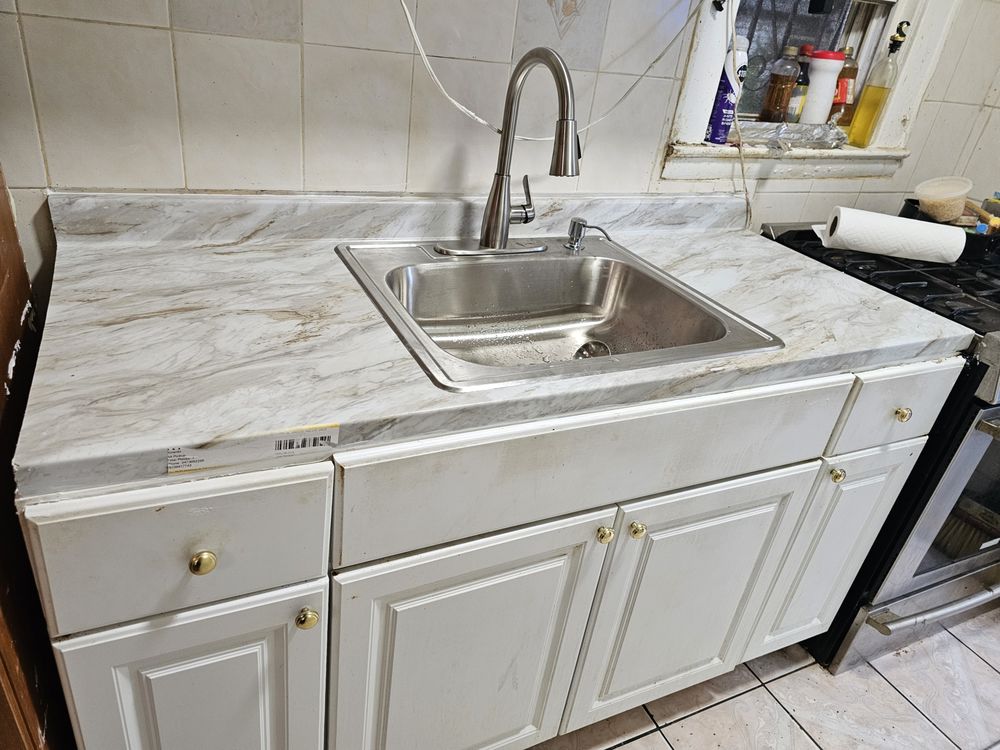 Slide of The Faucet Experts