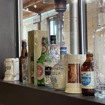 Old Soul Pizza - Row of unique bottles and mugs - Pizza Near Me - Roseburg, Oregon Old Soul Pizza - Row of unique bottles and mugs - Pizza Near Me - Roseburg, Oregon
