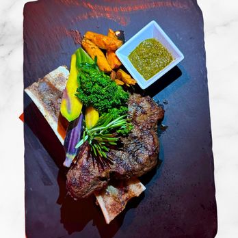 Pier 6 Rooftop - The M.Cut: Chef's choice, elevated. Served with chermoula sauce and a seasonal side. - Lounges Near Me - Pompano Beach, Florida