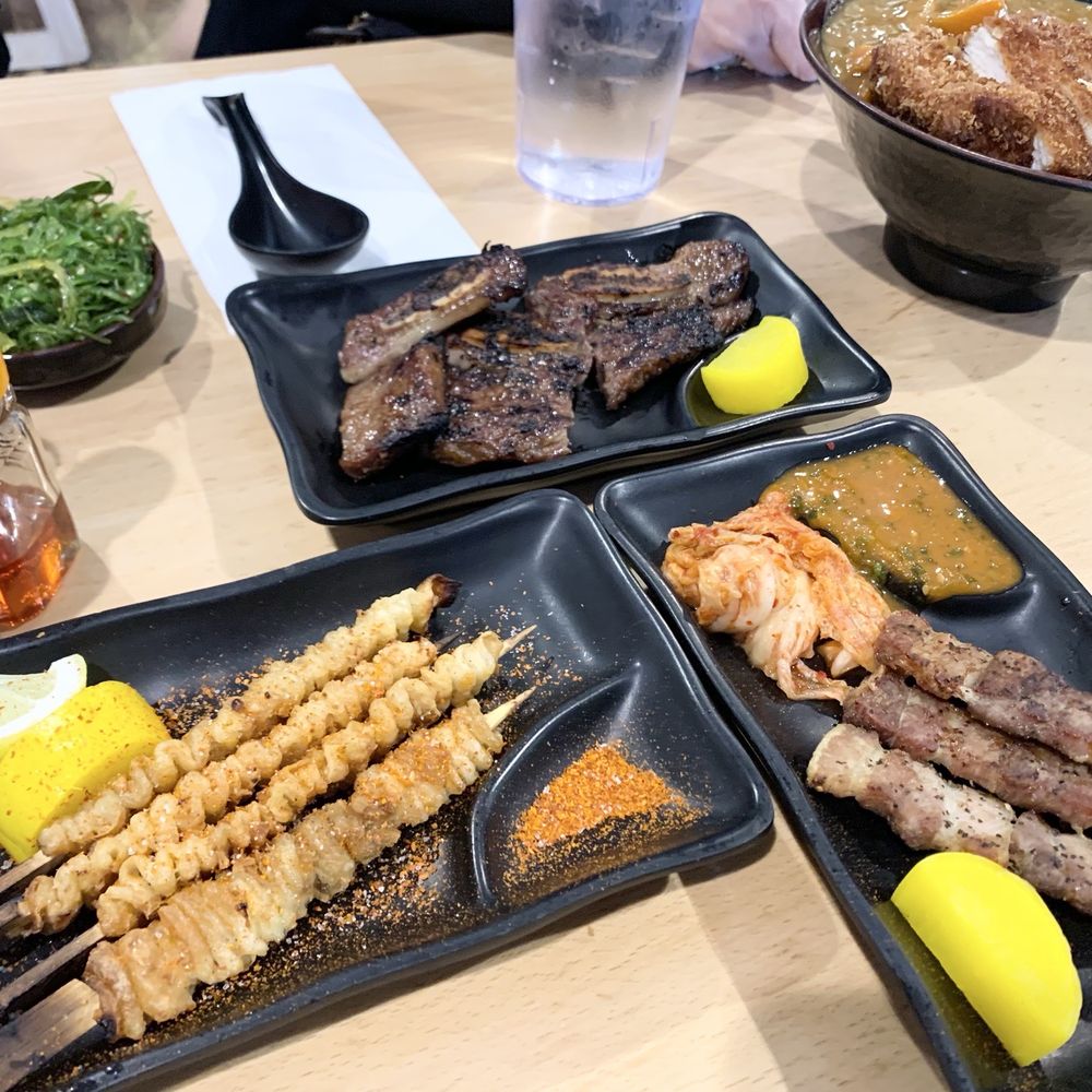 Haru - Clockwise: Galbi (beef short ribs) Pork Belly skewers, Kawa Chicken Skin - Ramen Near Me - Reno, Nevada Haru - Clockwise: Galbi (beef short ribs) Pork Belly skewers, Kawa Chicken Skin - Ramen Near Me - Reno, Nevada