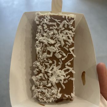 PopsiBar - Coconut popsicle, dipped in milk chocolate, with coconut shavings - Ice Cream & Frozen Yogurt Near Me - Spring, Texas