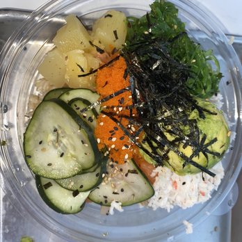 Hi Poke - a plastic container filled with vegetables and rice - Poke Near Me - San Diego, California Hi Poke - a plastic container filled with vegetables and rice - Poke Near Me - San Diego, California