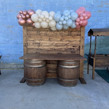 A & B Event Rentals - Rustic backdrop, candy cart, wide barrel table and balloon design by us - Party Equipment Rentals Near Me A & B Event Rentals - Rustic backdrop, candy cart, wide barrel table and balloon design by us - Party Equipment Rentals Near Me