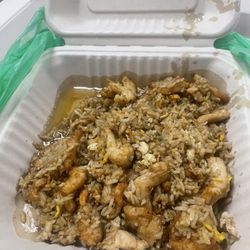 Chicken fried rice. 10/27/23 paid 13 for a pan of grease and fried rice with old chicken eggs and no veggies