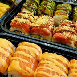 AB Fish Market - top to bottom: dragon roll, sunnyside roll, crazy salmon roll fries on the side