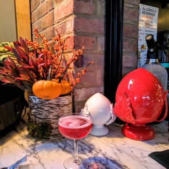 Masseria - Bar area with holiday decorations. My friend had a drink with a scoop of sorbet added. - Italian Near Me - Washington, DC, District of Columbia