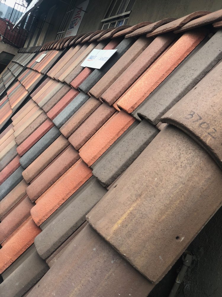 Slide of America Building Materials