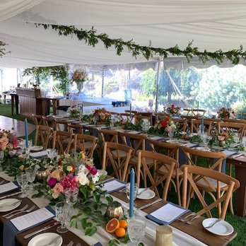 MacCallum House Weddings - Table setting. Notice the greenery hung from the ceiling. - Wedding Planning Near Me - Mendocino, California MacCallum House Weddings - Table setting. Notice the greenery hung from the ceiling. - Wedding Planning Near Me - Mendocino, California